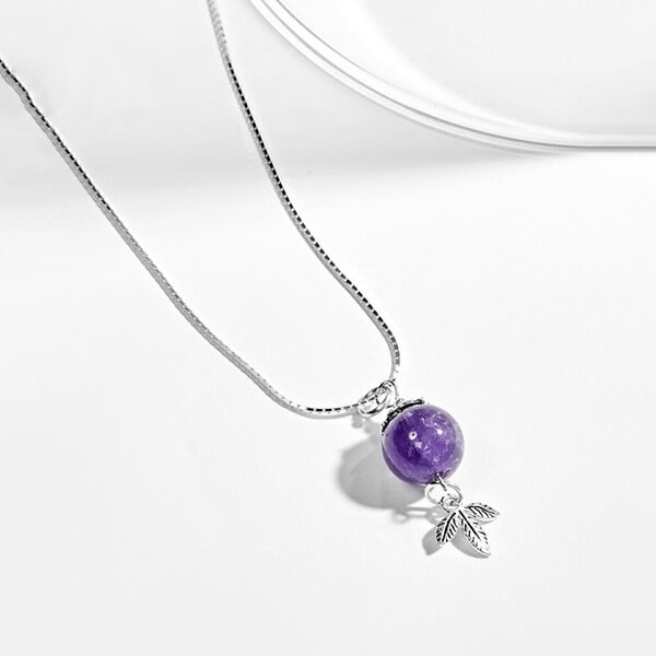 Mặt dây chuyền đá thạch anh màu tím cho người mệnh Mộc